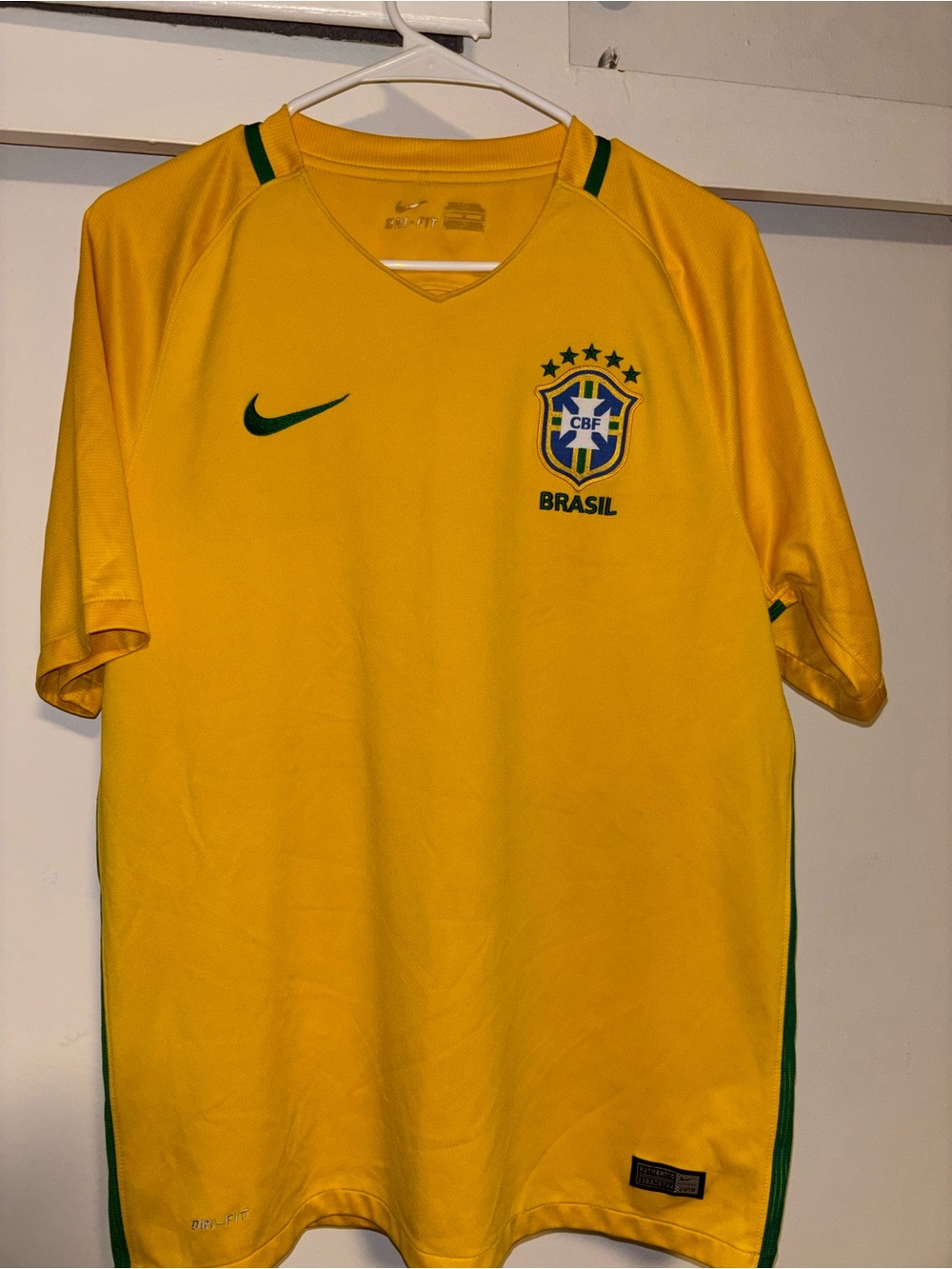 Up for sale is an 100% authentic Brazil National Football Team short-sleeve home